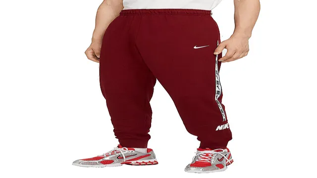 nike sportswear repeat tape fleece cargo jogger pants